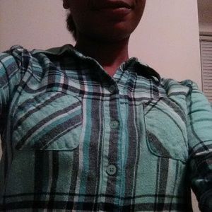 A shirt with two pockets roll and up sleeves.
